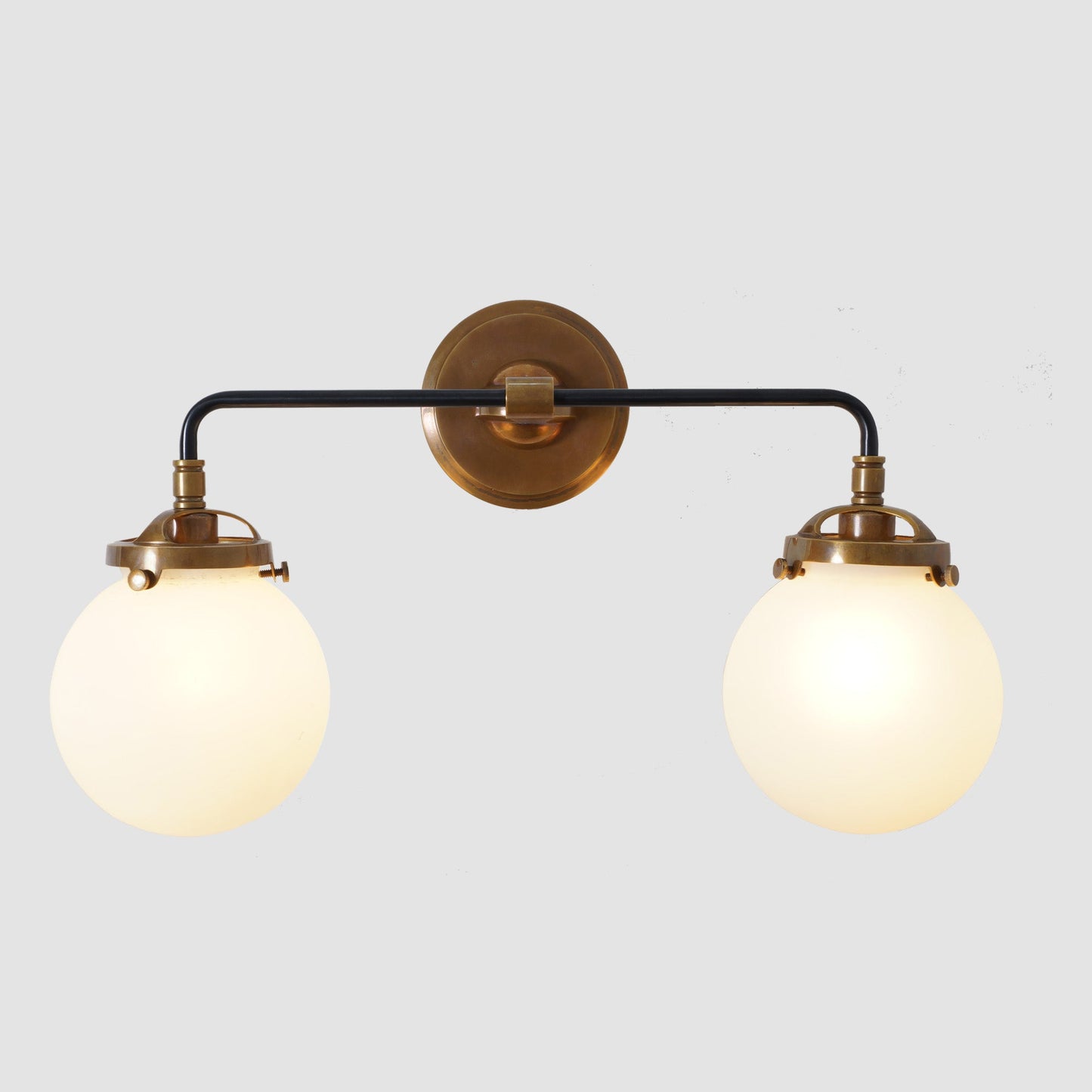Mid Century Style Modern Brass Double Globe Wall Sconce